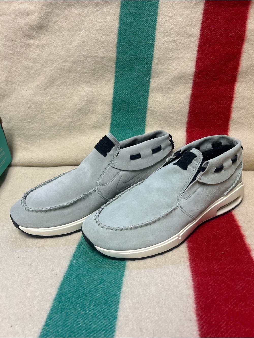 Nike Gray Suede Slip-On Loafers with Black Accents.